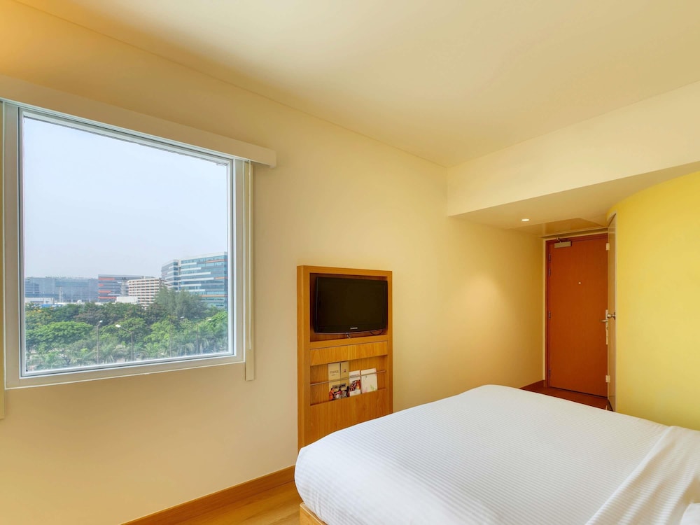 Habitación Deluxe con Cama Queen con Beneficio Extra - 15% de descuento en F&B, 2 prendas de lavandería y WiFi del hotel Ibis Bengaluru Outer Ring Road. Foto 3