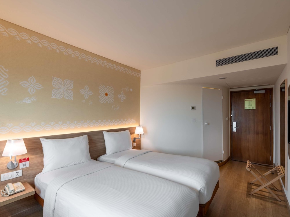 Habitación Superior con Dos Camas Individuales - Traslados al Aeropuerto Gratuitos del hotel Ibis Mumbai Airport. Foto 1
