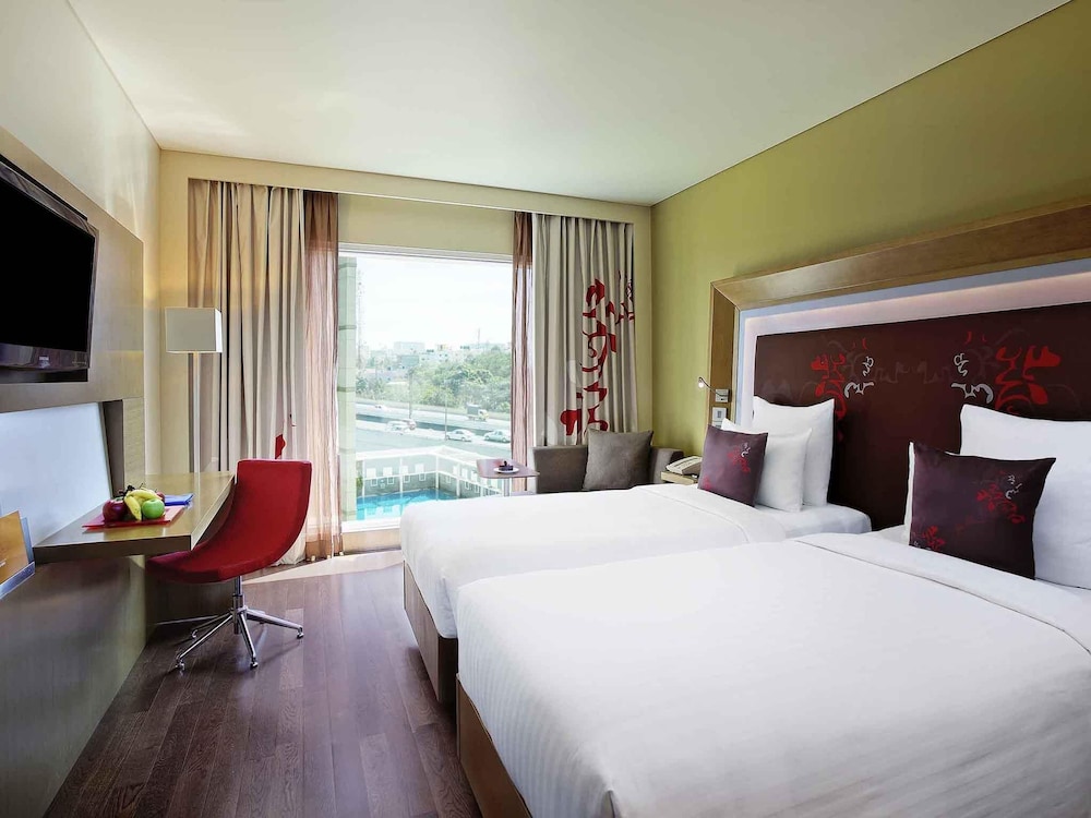 Habitación Premier con 1 cama individual del hotel Novotel Bengaluru Outer Ring Road. Foto 6