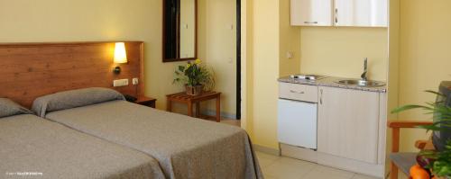 Estudio 2 Camas individuales kitchenette kitchenette del hotel Flamero. Foto 3