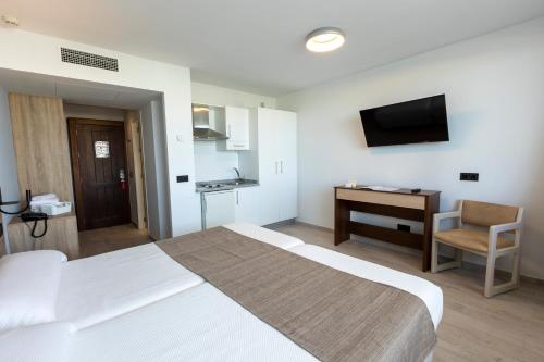 Estudio Superior Sofá Cama incluido 2 Camas individuales kitchenette del hotel Flamero. Foto 2