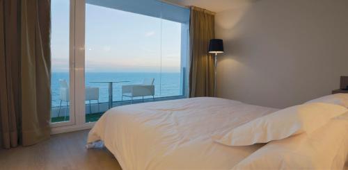Habitación Doble Deluxe con vistas al mar del hotel Flamero. Foto 3