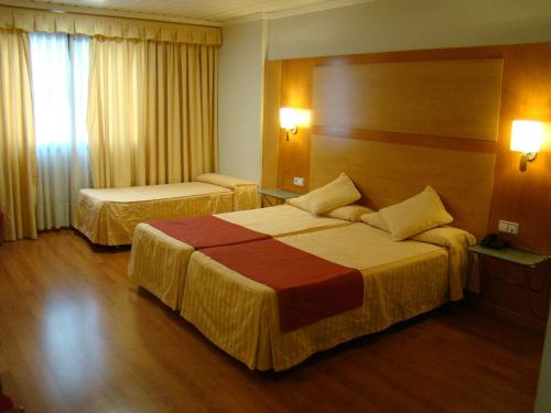 Habitación Triple del hotel Reconquista. Foto 6