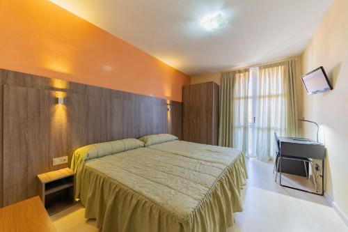 Habitación Familiar del hotel Monreal. Foto 1