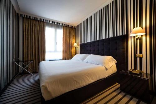 Habitación Doble con cama supletoria del hotel Clarín. Foto 2