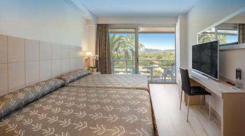 Habitación Doble con 2 camas dobles y terraza del hotel RH Bayren Parc