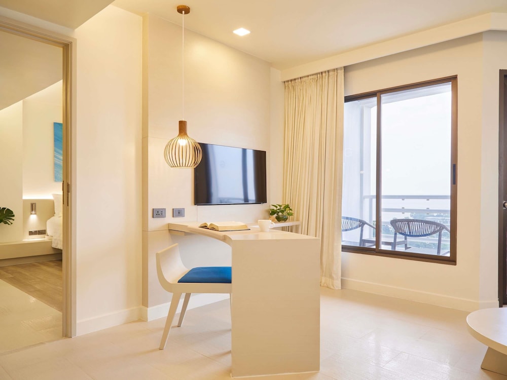 Habitación Premium, 2 habitaciones (1 King Size and 2 Single Size Beds) del hotel Pullman Pattaya G. Foto 1