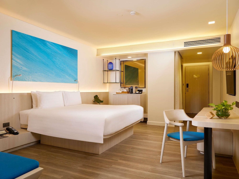 Habitación Premium, 1 cama de matrimonio grande del hotel Pullman Pattaya G. Foto 6