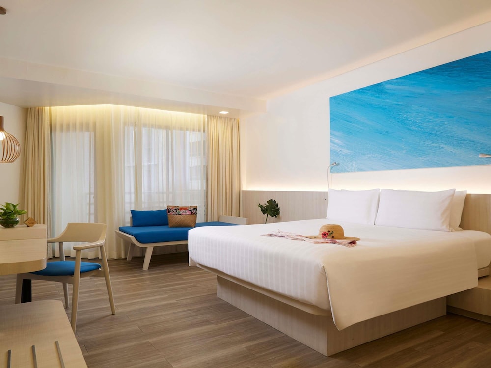 Habitación Premium, 1 cama de matrimonio grande del hotel Pullman Pattaya G. Foto 7