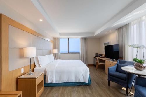 Suite Executive situada frente al mar - 1 cama extragrande del hotel Hilton Copacabana Rio De Janeiro. Foto 2