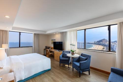 Suite Executive situada frente al mar - 1 cama extragrande del hotel Hilton Copacabana Rio De Janeiro. Foto 5