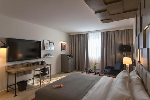 Habitación con cama extragrande. del hotel Canopy By Hilton Zagreb - City Centre. Foto 6