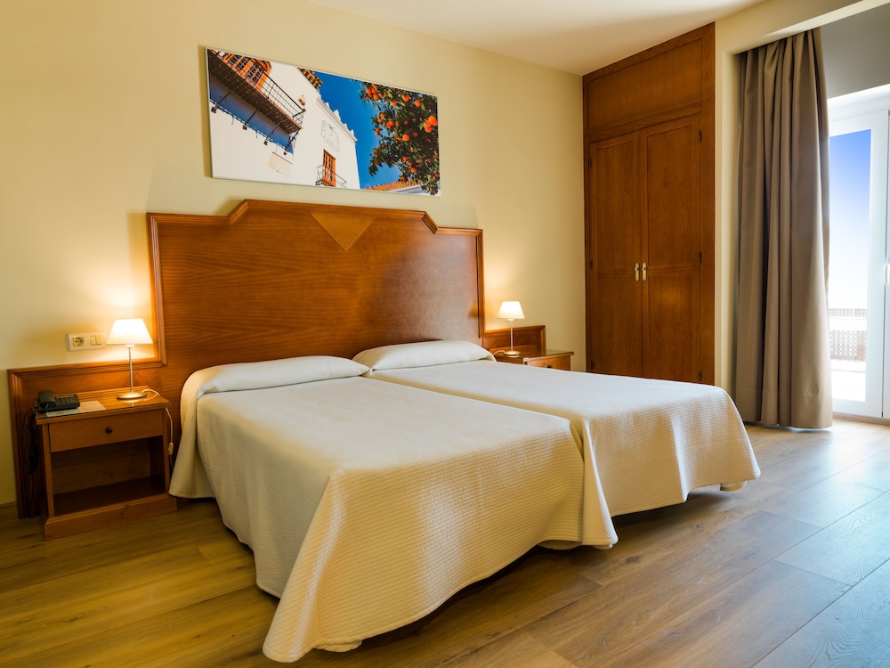 Habitación estándar doble del hotel Monarque El Rodeo