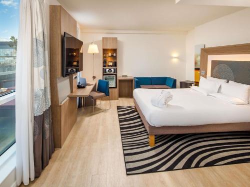 Habitación Executive Premium con balcón - 1 cama grande del hotel Novotel London Blackfriars. Foto 1