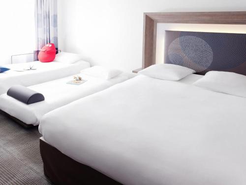 Habitación Premium - Cama grande y 2 sofás cama individuales del hotel Novotel London Blackfriars. Foto 9