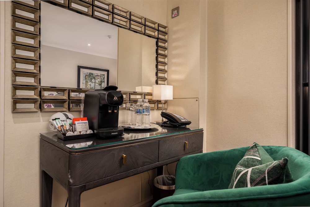 Habitación Deluxe doble del hotel The Beaufort Knightsbridge. Foto 1
