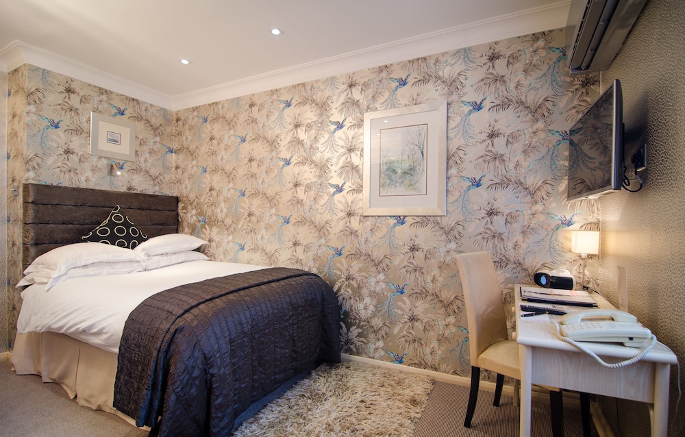 Habitación individual del hotel The Beaufort Knightsbridge. Foto 1
