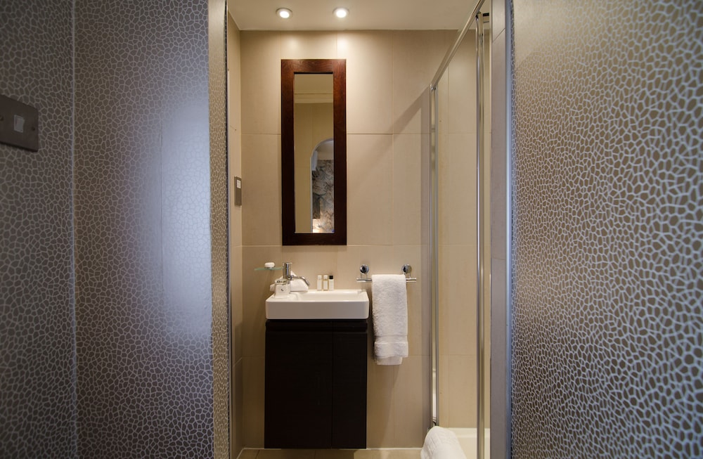 Habitación individual del hotel The Beaufort Knightsbridge. Foto 7