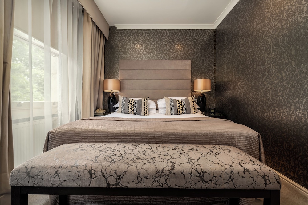 Suite junior del hotel The Beaufort Knightsbridge. Foto 10