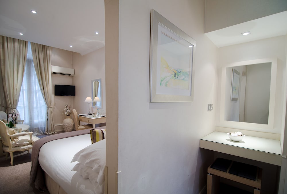 Habitación estándar doble del hotel The Beaufort Knightsbridge. Foto 1