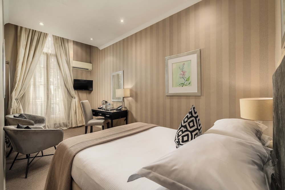 Habitación estándar doble del hotel The Beaufort Knightsbridge. Foto 5