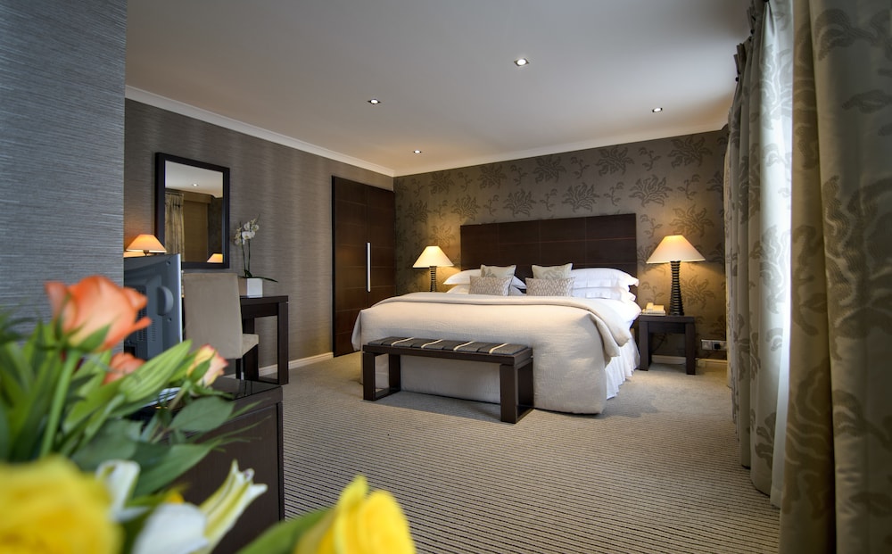 Habitación Deluxe con 1 cama doble o 2 individuales del hotel The Beaufort Knightsbridge. Foto 3