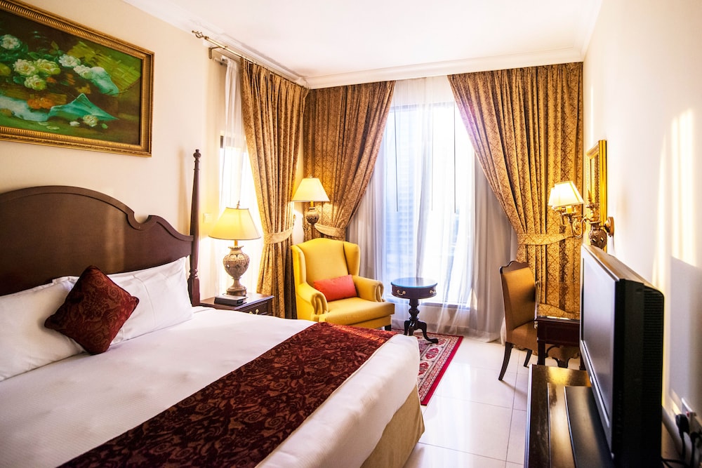 Apartamento Familiar de dos dormitorios con una cama king size y 2 camas individuales, Vistas a la ciudad del hotel Mercure Hotels Suites And Apartments Barsha Height. Foto 2