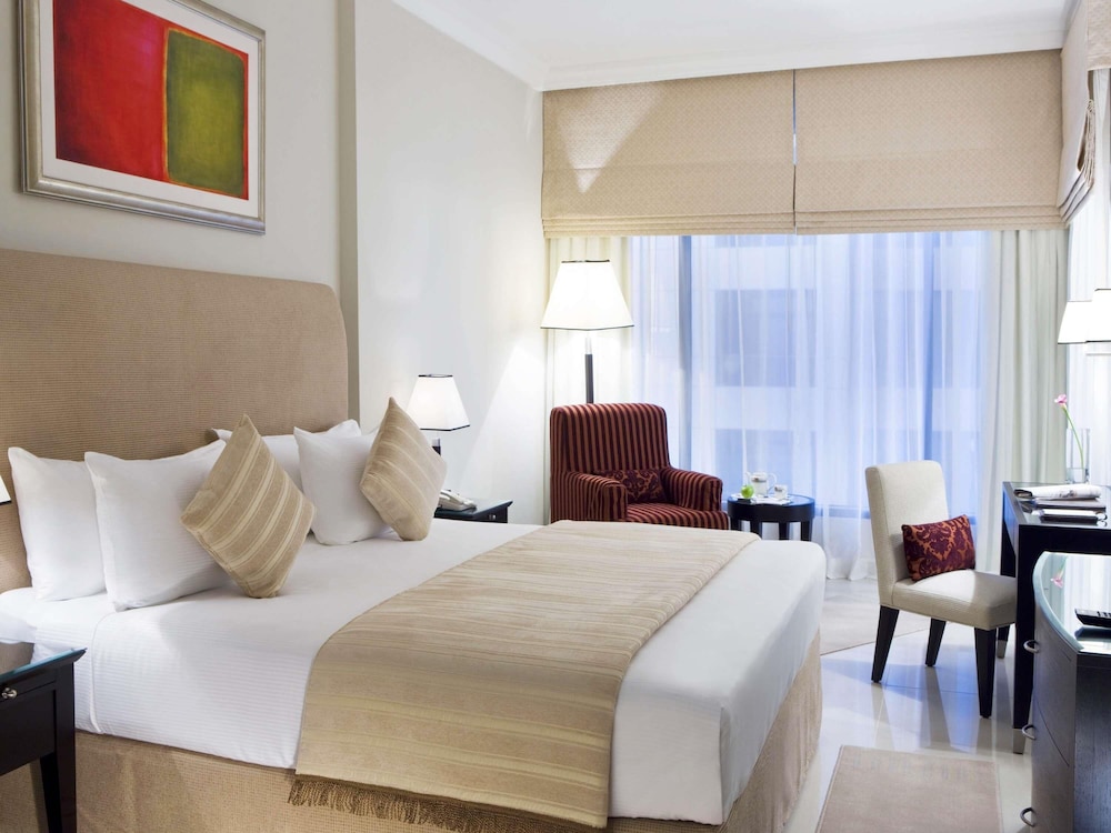 Apartamento Familiar de dos dormitorios con una cama king size y 2 camas individuales, Vistas a la línea del horizonte del hotel Mercure Hotels Suites And Apartments Barsha Height