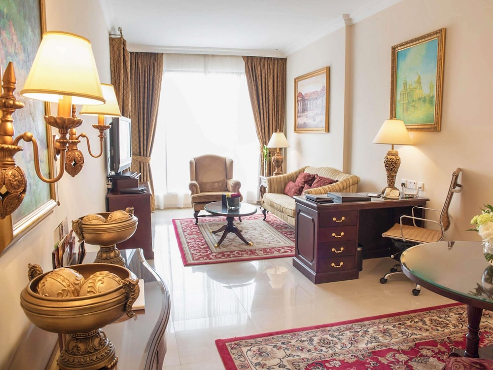 Apartamento Familiar de un dormitorio con 2 camas individuales, Vistas a la ciudad del hotel Mercure Hotels Suites And Apartments Barsha Height. Foto 1