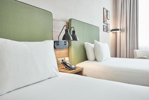 Habitación Doble - 2 camas dobles del hotel Hilton Garden Inn Sevilla. Foto 2