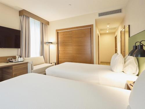 Habitación Doble - 2 camas del hotel Hilton Garden Inn Sevilla. Foto 4