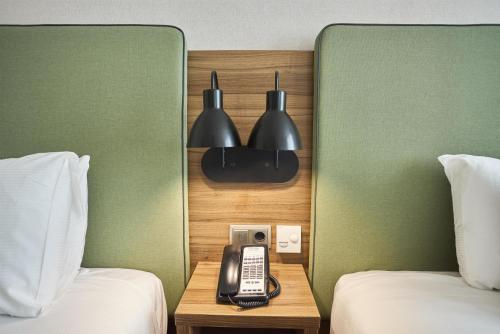 Habitación Doble - 2 camas del hotel Hilton Garden Inn Sevilla. Foto 4