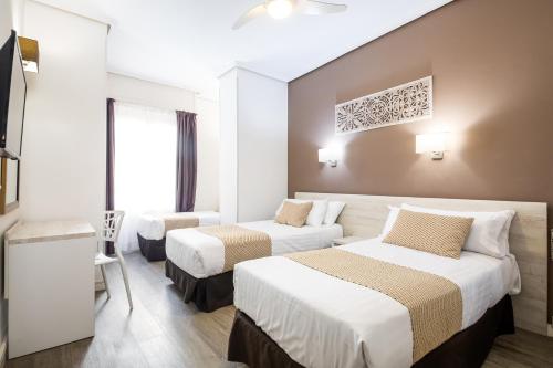 Habitación Triple del hotel Sweet Continental