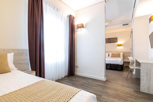 Habitación Triple del hotel Sweet Continental. Foto 1