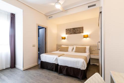 Habitación Triple del hotel Sweet Continental. Foto 3