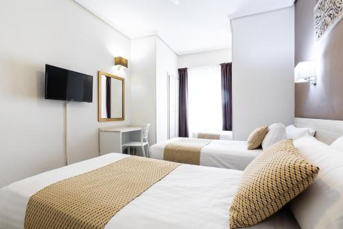 Habitación Triple del hotel Sweet Continental. Foto 4