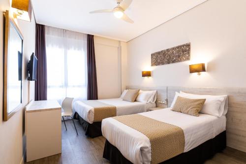 Habitación Triple del hotel Sweet Continental. Foto 7