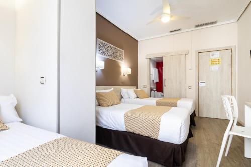 Habitación Triple del hotel Sweet Continental. Foto 8