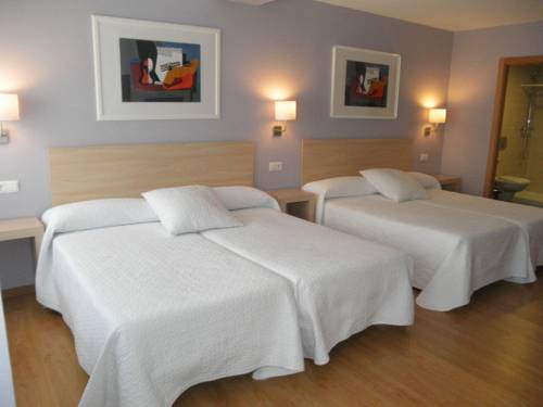 Habitación cuádruple del hotel Dormavalència