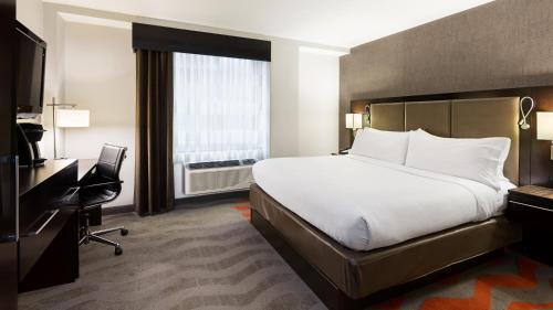 Habitación Estándar con ducha accesible en silla de ruedas - cama extragrande - Adaptada para personas con movilidad reducida del hotel Holiday Inn Nyc - Lower East Side. Foto 2