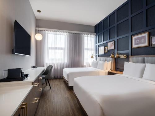 Double Suite with Transfer Shower - Mobility Accessible del hotel voco Fiorello - LaGuardia East, an IHG Hotel