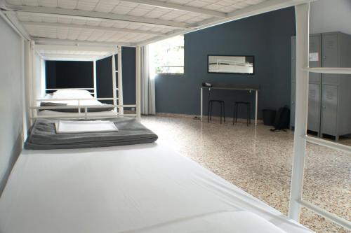 Cama en habitación compartida mixta de 6 camas del hotel Quart Youth