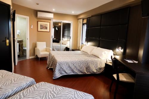 Habitación cuádruple del hotel Benetússer. Foto 1