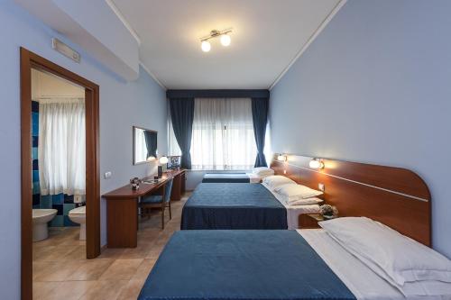 Habitación Cuádruple del hotel Millennium Gold. Foto 3