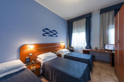 Habitación Triple del hotel Millennium Gold. Foto 4