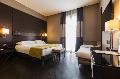 Habitación Triple Executive del hotel Rome Times