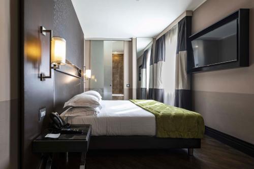 Habitación Triple Executive del hotel Rome Times. Foto 4