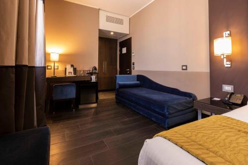 Habitación Triple Executive - Edificio independiente del hotel Rome Times. Foto 2