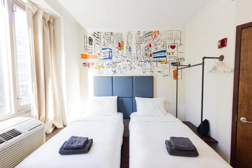 Habitación Doble Estándar - 2 camas del hotel JG Sohotel. Foto 10