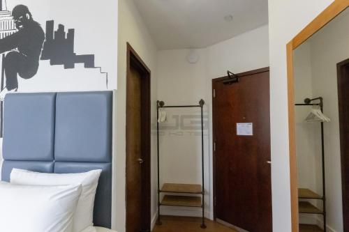 Habitación Doble Estándar - 2 camas del hotel JG Sohotel. Foto 12